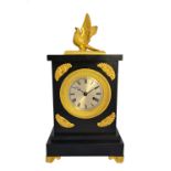 A Regency ormolu black slate mantel timepiece,