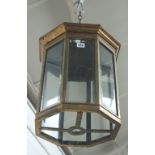 A gilt metal and glass hall lantern, 19th century, of octagonal form,