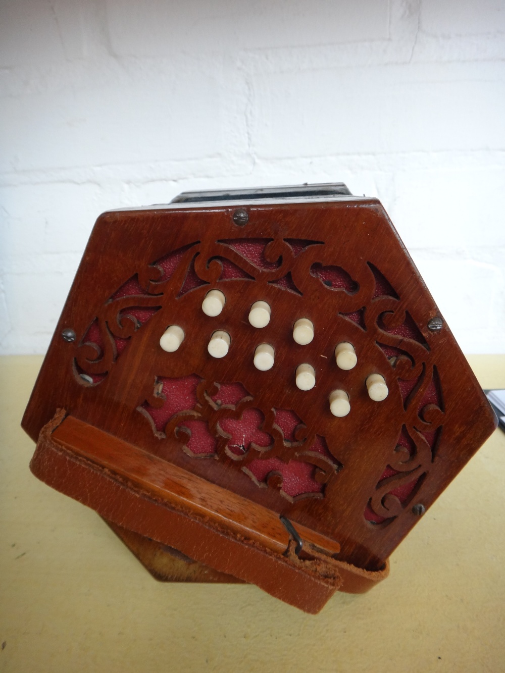 A Lachenal & Co concertina, 19th century, with forty seven bone buttons on pierced mahogany ends, - Image 6 of 11