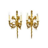 A pair of French ormolu twin light wall appliques, 20th century,