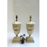 A pair of modern table lamps, each of urn form,