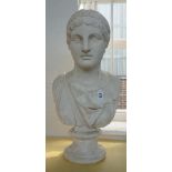 A modern plaster bust depicting a female in 19th century head dress, on a socle, 58cm high.