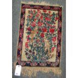 Two Tree of Life Kerman mats, Persian, one with ivory field with a tree and birds, 76cm x 54cm,