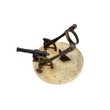 A French bronze and marble cannon sundial or noon day gun, circa 1820,