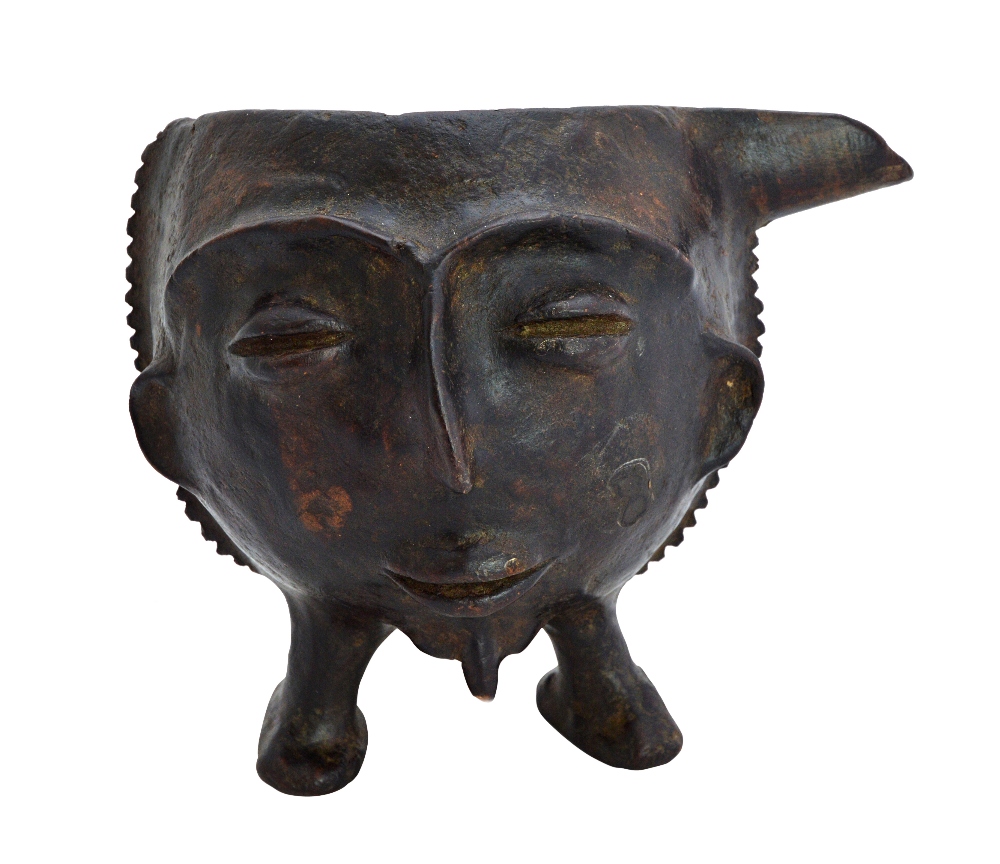 An unusual African fertility vessel, early 20th century, coconut and leather bound,