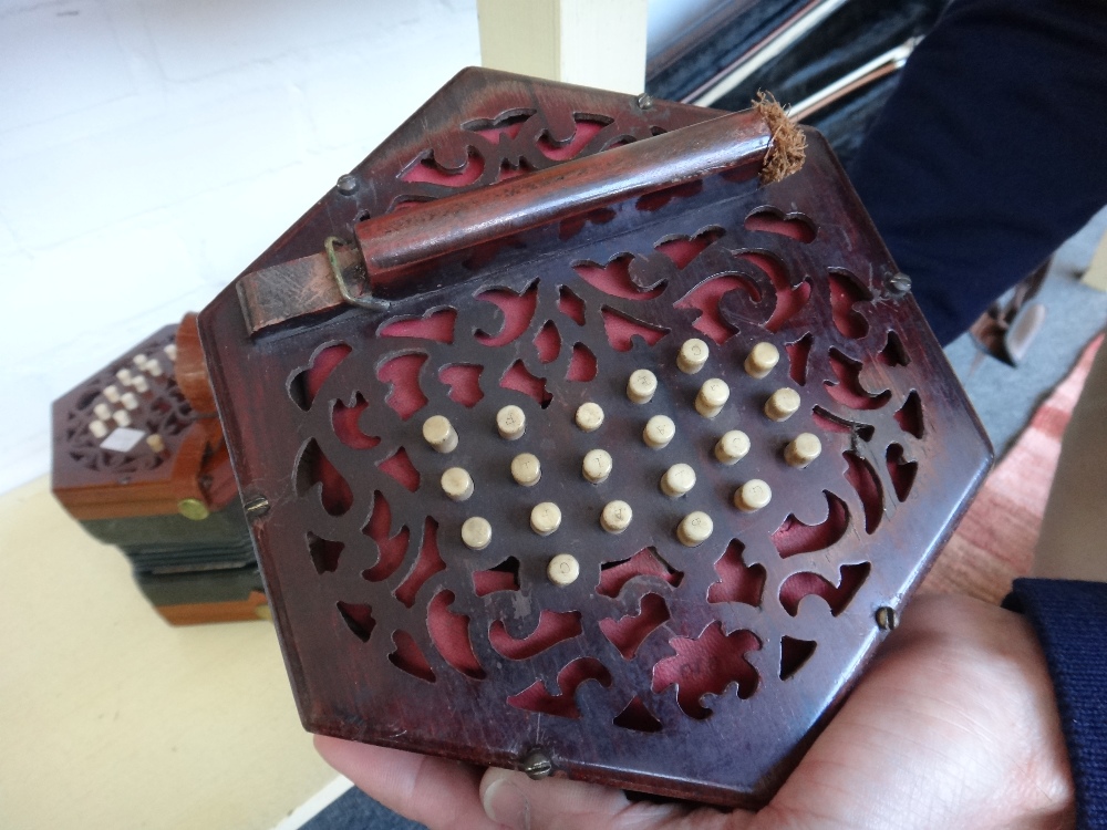 A Lachenal & Co concertina, 19th century, with forty seven bone buttons on pierced mahogany ends, - Image 10 of 11