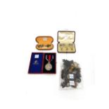 An Edward VII Coronation medal, silver issue 1902, cased, a pair of cufflinks and three studs,