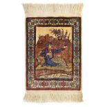 A fine silk Hereke pictorial piece, Turkish, depicting a figure in a landscape by a river,