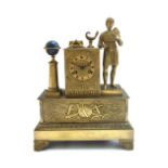 A French gilt metal mantel clock of Empire style, late 19th century,