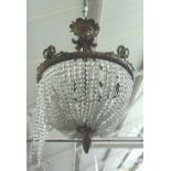 A bronze and beadwork bag chandelier, late 19th century, the acanthus cast circlet,