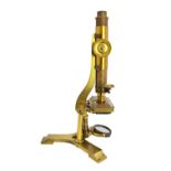 A lacquered brass microscope by 'J B Dancer, Optician Manchester',