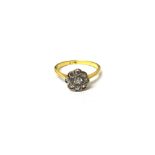 A gold and diamond nine stone cluster ring,