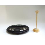 A pietra dura oval desk stand, 19th century, of oval form, inlaid with flowers, on four bun feet,