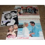 Two 'Grease' lobby cards, a signed photo and a large poster.