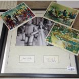 A framed photo of Dorothy, Tinman and Scarecrow from 'Wizard Of Oz',