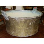 A 19th century brass French cheese vat.