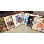 A group of six mid-20th century posters, some under glass.