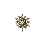 A Victorian diamond brooch, designed as a six pointed star burst,