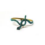 A Victorian turquoise set oval scarf pin brooch, designed as an entwined snake,