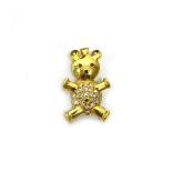 A gold, diamond and coloured gemstone set pendant brooch, designed as a Teddy bear.
