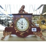 A French marble and spelter mounted mantel clock, late 19th century,