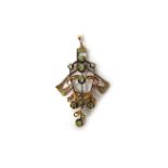 A Russian gold and demantoid garnet pendant, in an openwork Art Nouveau pierced scroll design,