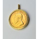A South Africa krugerrand 1970, in a gold pendant mount, detailed 9 CT, weight 37 gms. Illustrated.