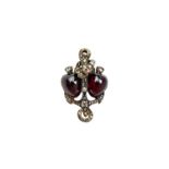 A Victorian diamond and carbuncle garnet set brooch, with Faith, Hope,