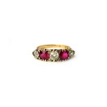 A gold, ruby and diamond five stone ring,