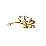 A Russian gold and diamond set brooch, in an Art Nouveau spray design with an 'X' motif,