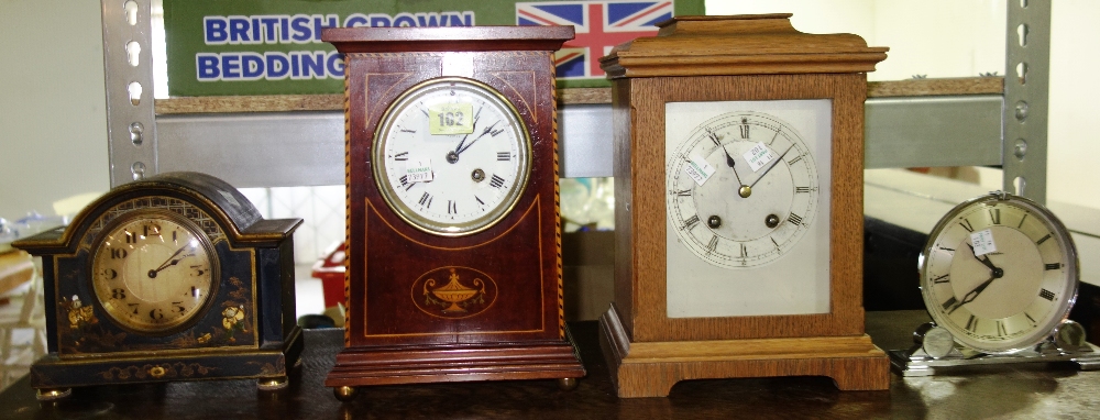 An Edwardian mahogany cased eight day mantel clock and oak mantel clock and a Chinoiserie mantel