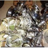 A quantity of assorted silver plate including a tea set, biscuit jar, dishes and sundry.