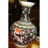 A large Chinese porcelain bottle vase, modern, enamelled with dragons, bats,