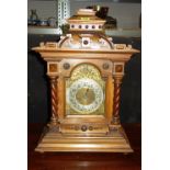 A 19th century walnut cased eight day mantel clock.