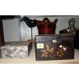 A group of boxes, including a black lacquer Chinoiserie tea caddy, a Scandinavian lidded food box,