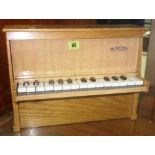 A Michelsonne child toy piano.