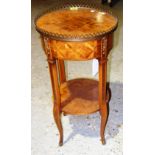 A gilt metal mounted parquetry inlaid Kingwood circular two tier occasional table, 35cm wide.