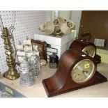 A group of collectables, including three mantel clocks, a hip flask, wall lights,