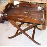 An 18th century style mahogany drop flap butler's tray, with folding stand, 64cm wide.