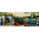 A very large quantity of assorted coloured and art glass including drinking vessels bowls and