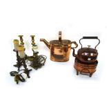 A Dutch copper and brass kettle and burner, a copper water can, a pair of brass candlesticks,