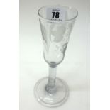 An English ale glass, the ogee bowl decorated with hops and barley, on a spreading circular foot,