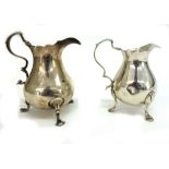 A George II silver pear shape cream jug, marks rubbed probably London 1747, with cut-edge,