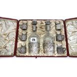 A cased silver mounted glass liqueur set