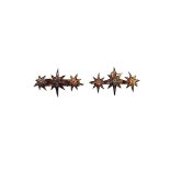 Two gold, diamond set and blue enamelled brooches, each designed as a row of three stars,