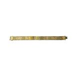 A gold bracelet, in a wide link design with engraved decoration, on a snap clasp, detailed 9 CT,