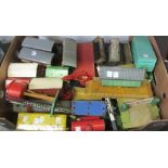 A quantity of Hornby O gauge wagons, coaches, tin buildings, boxed track and accessories (2 boxes).