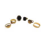 Two 9ct gold and agate set signet rings, two gold signet rings, a 9ct gold and diamond set ring,
