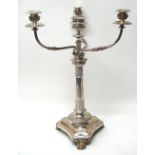 A silver plated French Empire style four light table candelabra,