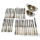 Six silver handled knives, with steel blades, the handles with beaded and banded decoration,